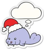 cartoon christmas walrus and thought bubble as a printed sticker vector