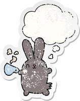 cute cartoon rabbit with coffee cup and thought bubble as a distressed worn sticker vector