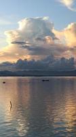 Fisherman on His Boat at Sunset. Fishermen Boat at Sunset photo