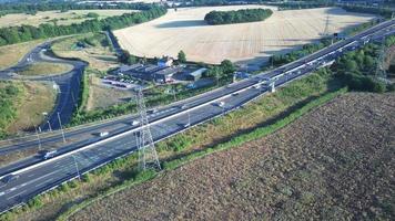 High Angle View of Luton Airport Junction Interchange of Motorways M1 J10 at Luton City of England UK. it is Connection Luton City and London Luton Airport Image Created on 11th August 2022 with Drone video