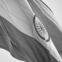 India flag flying at Connaught Place with pride in blue sky, India flag fluttering, Indian Flag on Independence Day and Republic Day of India, waving Indian flag, Flying India flags - Black and White photo