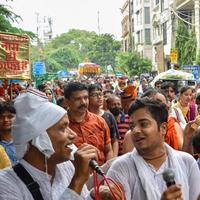 New Delhi, India July 01 2022 - A huge gathering of devotees from different parts of Delhi on the occasion of ratha yatra or rathyatra. Rath for Lord Jagannath pulled by people, Jagannath Rath Yatra photo