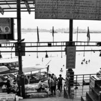 Garh Mukteshwar, UP, India, June 11 2022 -People are taking holy dip on the occasion of Nirjala Ekadashi, A view of Garh Ganga Brij ghat which is very famous religious place for Hindus-Black and White photo