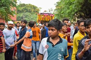 New Delhi, India July 01 2022 - A huge gathering of devotees from different parts of Delhi on the occasion of ratha yatra or rathyatra. Rath for Lord Jagannath pulled by people, Jagannath Rath Yatra photo