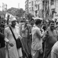 New Delhi, India July 01 2022 - A huge gathering of devotees from different parts of Delhi on the occasion of ratha yatra or rathyatra. Rath for Lord Jagannath pulled by people, Jagannath Rath Yatra photo