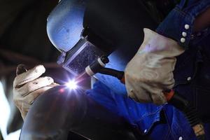 welder at factory work photo