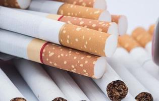 Closeup of a pile of cigarettes photo