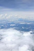 Aerial view of peaceful earth covered in clouds photo