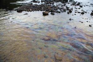 Gulf oil spill is shown on a beach photo