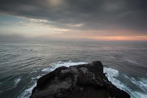 Blue wave at sunset Bali Beach ,Indonesia photo