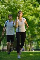 Young couple jogging photo
