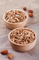 granola in wood bowl photo