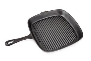 Empty grill iron pan isolated on white background photo