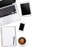 Top view laptop computer or notebook,mobile phone and cup of latte art coffee on wooden table. Business template mock up for adding your text. photo