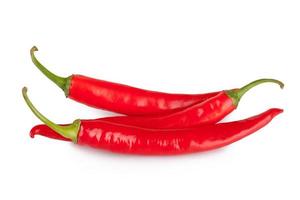 red chili or chilli cayenne pepper isolated on white background photo