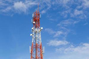 Communication tower and blue sky with cloud photo