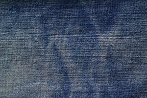 Fondo de textura de mezclilla blue jeans foto