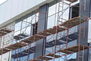 Scaffolding installed along the facade of the building photo