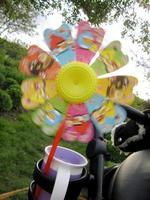 Photo on theme of colored plastic large children's toy wind turbine