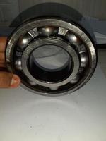 Damaged bearings on the table, industrial machinery parts photo