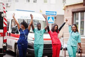 Group of african paramedic ambulance emergency crew doctors. photo