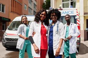 Group of african paramedic ambulance emergency crew doctors. photo