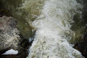 Incredible and stormy Prut river at Carpathian mountains, Jaremcze resort, Ukraine, Europe. photo