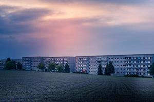 residential area of the GDR with evening sky photo