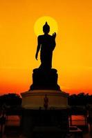 budha statue in sunset photo