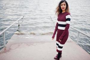 Portrait of young beautiful indian or south asian teenage girl in dress. photo