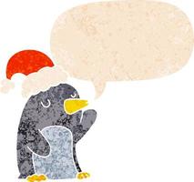 Lindo pingüino de navidad de dibujos animados y burbuja de habla en estilo retro texturizado vector