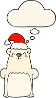 cartoon bear wearing christmas hat and thought bubble in comic book style vector