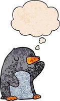 cartoon penguin and thought bubble in grunge texture pattern style vector