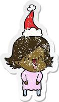 distressed sticker cartoon of a laughing woman wearing santa hat vector