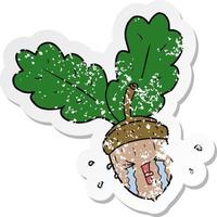 distressed sticker of a cartoon crying acorn vector