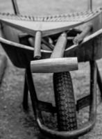 Wheelbarrow with garden tool photo