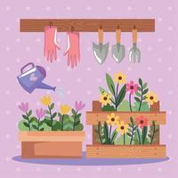 gardening tools hanging with flowers vector