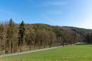 Country road through a landscape photo