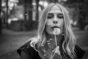 young woman with blowball photo