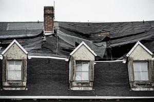 Old broken down dilapidated wooden house photo