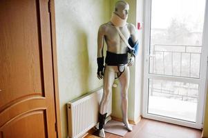 Mannequin with cast on arm and neck at prosthetist clinic. photo