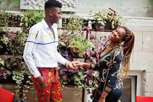 Handsome stylish african american couple posed at street together in love photo