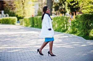 African american doctor female with stethoscope posed outdoor. photo