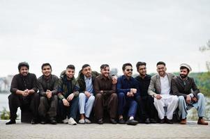 Group of pakistani man wearing traditional clothes salwar kameez or kurta. photo