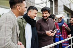 Group of pakistani man wearing traditional clothes salwar kameez or kurta. photo