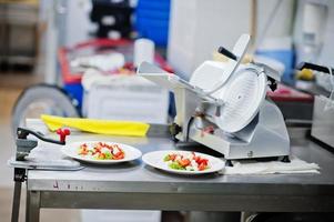 Salad in italian restaurant kitchen. photo