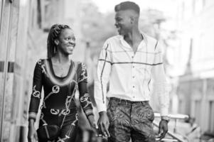 Handsome stylish african american couple posed at street together in love. photo
