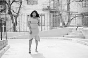 African american woman model xxl in orange dress. photo