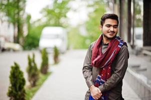 Indo pakistani man wear traditional clothes achkan or sherwani. photo