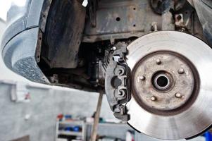 Car brakes repair and maintenance theme. photo